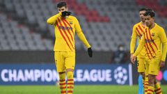 Gerard Pique (L) and Philippe Coutinho at the end of Barcelona's 3-0 defeat at the hands of Bayern Munich that sent them packing from the Champions League