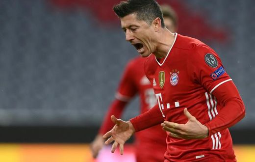 Robert Lewandowski celebrates converting Bayern Munich's first-half penalty against Lazio on Wednesday