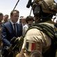 France is attempting to overcome US reservations about financial backing for anti-terrorism forces in the Sahel region of Africa, pictured in May 2017 when French President Emmanuel Macron (C), visited the French troops in northern Mali