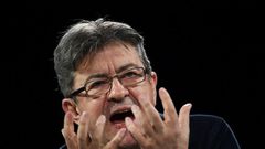 French presidential election candidate for the far-left coalition La France insoumise Jean-Luc Melenchon gestures as he delivers a speech during a campaign rally on April 2, 2017, in Deols, central France