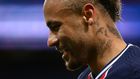 All smiles: Paris Saint-Germain's Neymar reacts after scoring on Sunday