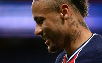 All smiles: Paris Saint-Germain's Neymar reacts after scoring on Sunday