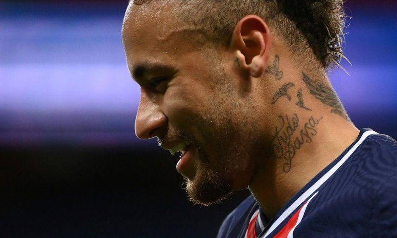 All smiles: Paris Saint-Germain's Neymar reacts after scoring on Sunday