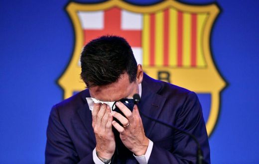 A emotional Messi struggles to compose himself before addressing reporters on his departure from Barcelona after 17 years playing for his only club