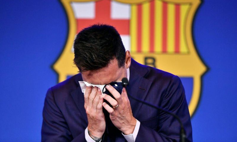 A emotional Messi struggles to compose himself before addressing reporters on his departure from Barcelona after 17 years playing for his only club