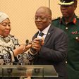 Tanzania's Vice President Samia Hassan Suluhu and President John Magufuli taking a call together in July 2019.