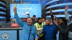 Manchester City fans celebrate winning the Premier League title