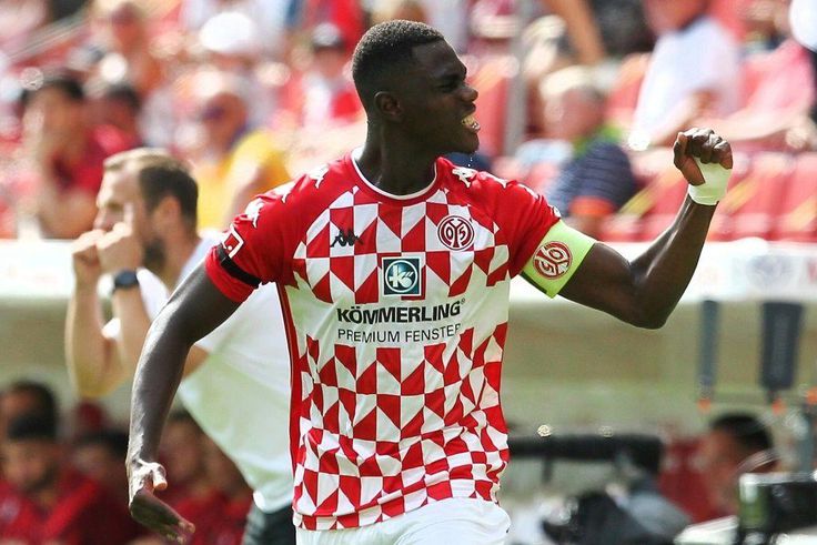 Mainz captain Moussa Niakhate celebrates scoring against Leipzig