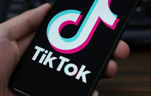 The TikTok logo displayed on the screen of a smartphone.Getty Images