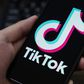 The TikTok logo displayed on the screen of a smartphone.Getty Images