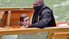Kanye West, 46, (right) and his Australian 'wife' Bianca Censori, 28, (left) have been banned for life by a Venetian boat rental company following their indecent exposure scandal in Italy last Monday