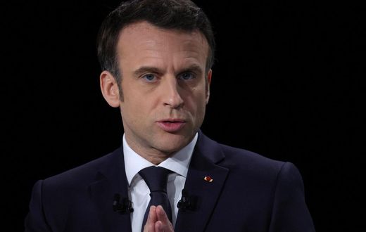 French President Emmanuel Macron, candidate for his re-election in the 2022 French presidential election, gestures as he speaks during a news conference to unveil his presidential program at Les Docks de Paris, in Aubervilliers near Paris, France, Marc...