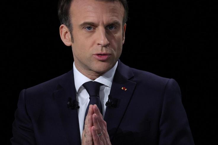 French President Emmanuel Macron, candidate for his re-election in the 2022 French presidential election, gestures as he speaks during a news conference to unveil his presidential program at Les Docks de Paris, in Aubervilliers near Paris, France, Marc...