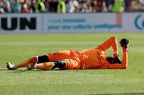 Mory Diaw à terre après l'explosion d'un pétard (P Guyot AFP