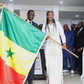 Amadou Ba remettant le drapeau aux Lionnes