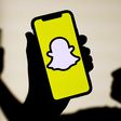 Snapchat announced on Monday it plans on introducing mid-roll ads in select Snap Stars' public stories.NurPhoto / Getty Images