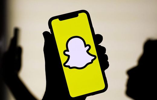 Snapchat announced on Monday it plans on introducing mid-roll ads in select Snap Stars' public stories.NurPhoto / Getty Images