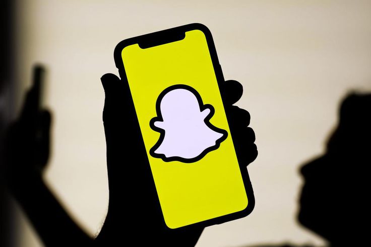 Snapchat announced on Monday it plans on introducing mid-roll ads in select Snap Stars' public stories.NurPhoto / Getty Images