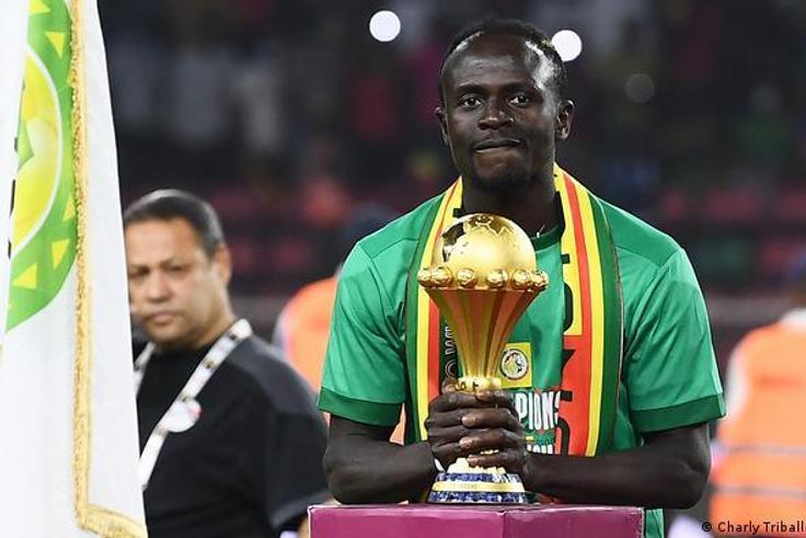 Sadio Mane with the AFCON trophy