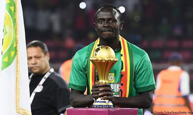 Sadio Mane with the AFCON trophy