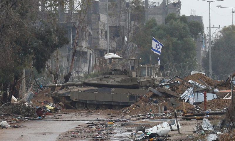 An Israeli tank near Gaza City on November 27.REUTERS/Ibraheem Abu Mustafa