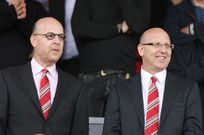 Manchester United directors Joel (right) and Avram Glazer on April 24, 2010.