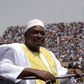 Gambian President Adama Barrow looks at the audience from the roof of a car as he arrives at the Independence Stadium in Bakau, west of the capital Banjul for his inauguration ceremony, on February 18, 2017