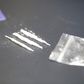 A stock photo shows a bag of cocaine with lines of the drug.Getty Images
