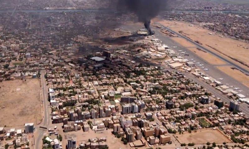 This image taken from AFPTV video footage on April 20, 2023, shows black smoke rising above the Khartoum International Airport amid ongoing fighting in Sudan.AFP via Getty Images