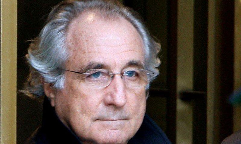 FILE PHOTO: Accused swindler Bernard Madoff exits the Manhattan federal court house in New York, U.S. on January 14, 2009. REUTERS/Brendan McDermid/File Photo