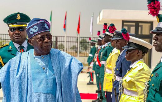 President Bola Tinubu inspects the guard of honour at the 60th anniversary of the Nigerian Defence Academy, Kaduna.  [Twitter:@NDefenceAcademy]