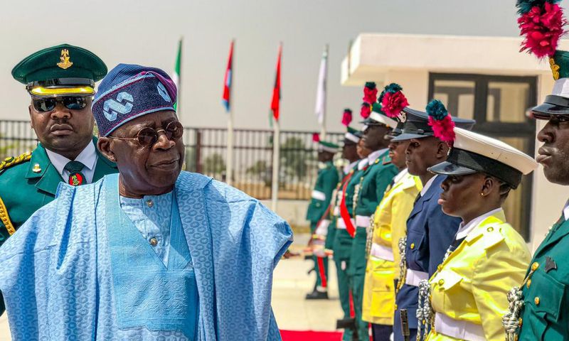 President Bola Tinubu inspects the guard of honour at the 60th anniversary of the Nigerian Defence Academy, Kaduna.  [Twitter:@NDefenceAcademy]