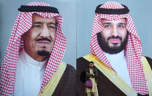 Billboards show portraits of Saudi Arabian Crown Prince Mohammed bin Salman (R) and his father and Saudi Arabia's King Salman bin Abdulaziz.AAMIR QURESHI