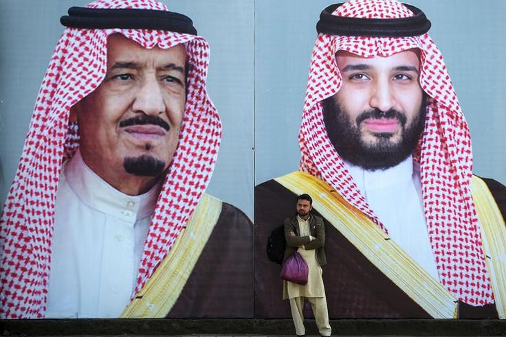 Billboards show portraits of Saudi Arabian Crown Prince Mohammed bin Salman (R) and his father and Saudi Arabia's King Salman bin Abdulaziz.AAMIR QURESHI