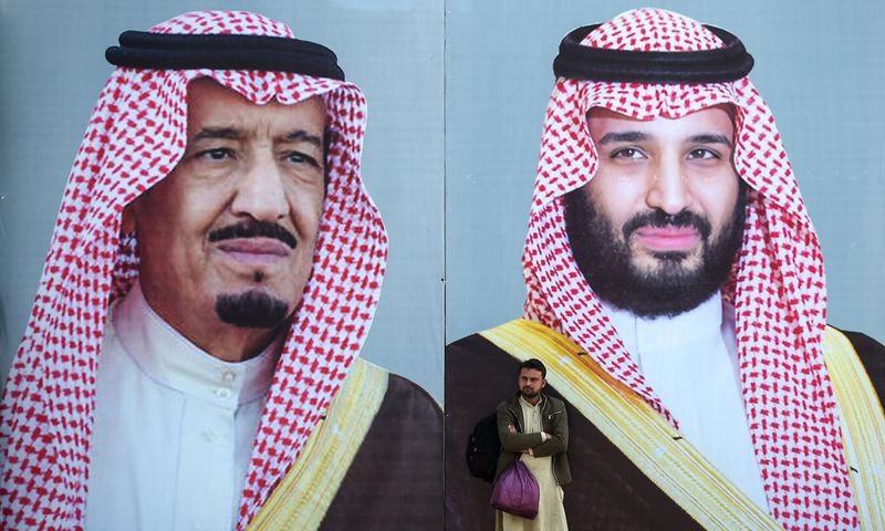 Billboards show portraits of Saudi Arabian Crown Prince Mohammed bin Salman (R) and his father and Saudi Arabia's King Salman bin Abdulaziz.AAMIR QURESHI