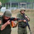 A fighter from Russian Wagner mercenary group conducts training for Belarusian soldiers on a range near the town of Osipovichi, Belarus July 14, 2023 in this still image taken from handout video.Voen Tv/Belarusian Defence Ministry/Handout via REUTERS