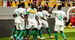 Les Lions du Sénégal célèbrent un but en Coupe du Monde.