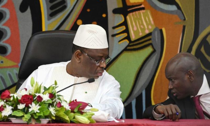 Senegal's President Macky Sall (L) and his Interior minister Aly Ngouille Ndiaye launched a national dialogue project though most opposition parties boycotted