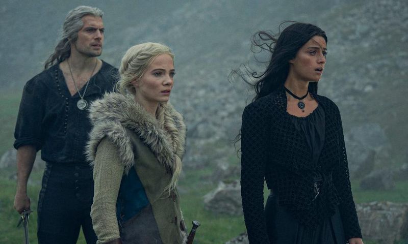 Henry Cavill, Freya Allan and Anya Chalotra in "The Witcher" season three.Susie Allnut / Netflix