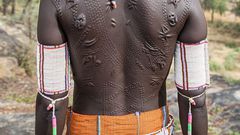 Larim woman with her scars [Lastplaces]