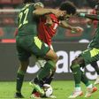 Mohamed Salah au combat avec Abdou Diallo et Idrissa Gana Guèye lors d'Egypte-Sénégal au Caire, le 25 mars 2022