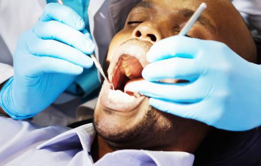 A patient being examined by a dentist