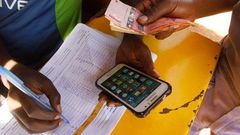 ___8925828___2018___10___2___9___mobile-money-tax