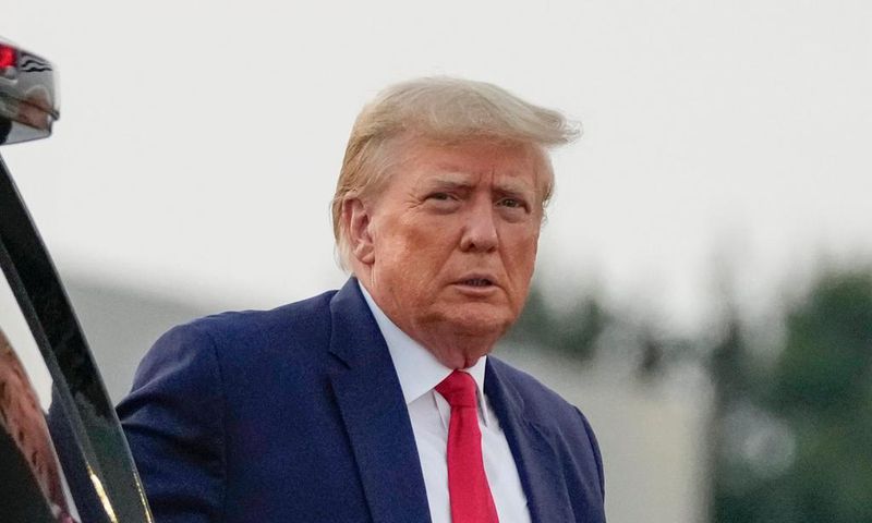 Former President Donald Trump following his booking in Fulton County jail.(AP Photo/Alex Brandon