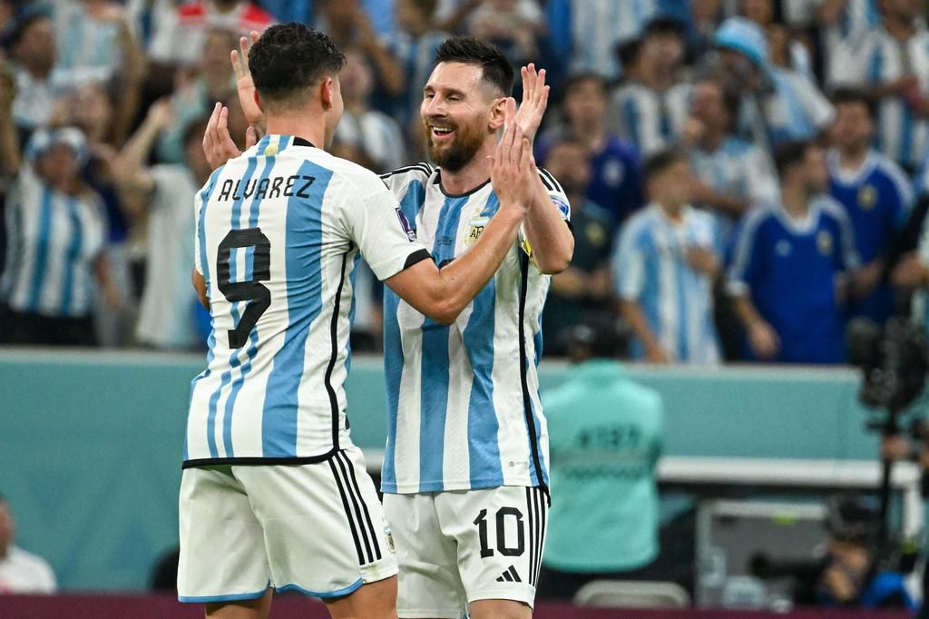 Lionel Messi and Julian Alvarez celebrate the third Argentine goal in the Match between the teams of Argentina vs Croatia, for the semifinal of the World Cup on December 14, 2022.