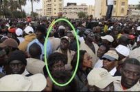 Macky Sall, en 2012, lors d'une manifestation contre un 3e mandat du président d'alors, Abdoulaye Wade.