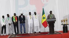 Macky Sall et les Lions vainqueurs de la CHAN