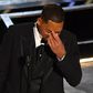 Will Smith en pleurs après avoir reçu l'Oscar du meilleur acteur Il a été récompensé quelques minutes à peine après avoir frappé Chris Rock - AFP