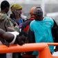 Des migrants sur un bateau des gardes cotes espagnols dans le port d'Arguineguin, sur l'archipel des Canaries, le 6 juin 2024. (Borja SuarezReuters)