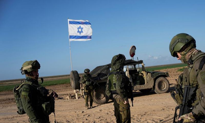 Israeli soldiers are seen near the Gaza Strip border in southern Israel on March 4, 2024.AP Photo/Ohad Zwigenberg
